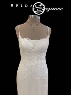 a white wedding dress on a mannequin with the words, bridal elegance