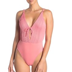 New Store Display/No Tag See Pictures Style# 190713 Pink Lemoade Color A Plunging Neckline Is Secured With A Super-Cute Self-Tie Closure On A Pintuck Pleated One-Piece Swimsuit. - Plunging V-Neck - Adjustable Shoulder Straps - Back Hook-And-Bar Closure - Self-Tie Bow On Front - Pintuck Pleated Top - Stitching Detail - Cutout Back - Lined Gusset - Moderate Coverage Feminine One-piece Bodysuit For Beach, Elegant Pink Bodysuit For Beach, Pleated Top, Pleat Top, Tie Bow, Store Display, Pin Tucks, Top Stitching, Plunging Neckline