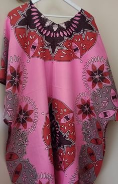 Ladies kaftan available in size 22 up to 32 100%cotton Authentic African print Thank you Pink Printed Kaftan With Kimono Sleeves, Printed Pink Tunic Kaftan, Pink Printed Tunic Kaftan, Pink Printed Short Sleeve Kaftan, Pink Cotton Short Sleeve Kaftan, Pink Floral Print Kaftan In Free Size, Pink Short Sleeve Kaftan, Patterned Printed Short Sleeve Kaftan, Patterned Short Sleeve Printed Kaftan