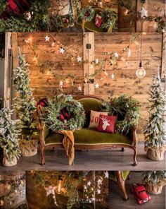 christmas decorations are displayed in front of a wooden wall with lights and garlands on it