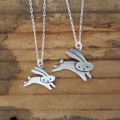 "This cute set is a great gift for your friends with kids.. or for your pregnant friends who can wear them both together! They are made from sterling silver, the mom measures 3/4\" high and the baby 1/2\" high. The \"baby\" hangs from a 16\" silver-plated cable chain and the \"mom\" hangs from an 18\" silver-plated cable chain. If you want two kids: https://www.etsy.com/listing/87244713/two-kids-famiy-necklace To see the \"mother\" necklace: https://www.etsy.com/listing/527507465/sterling-flying Bunny Necklace, Mother Necklace, Pregnant Friends, Mother Child, Two Kids, Daughter Necklace, Mothers Necklace, Cute Sets, Perfect Gift For Mom