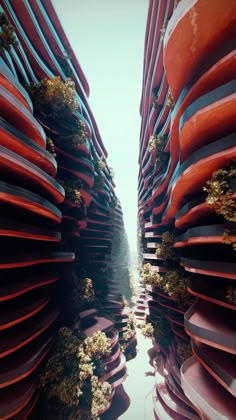 an aerial view of some very tall buildings with plants growing on the side of them