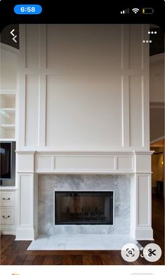 an image of a fireplace with white paint