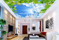 the ceiling is decorated with blue sky and white clouds, while birds are flying overhead