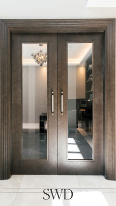 Enhance your space with these modern glass panel double doors, designed with a luxurious wood finish for a stylish and sophisticated look. Perfect for home offices, dining rooms, or modern living areas, these doors combine transparency with privacy. Crafted with premium materials and sleek handles, they provide a contemporary touch while allowing natural light to flow seamlessly.

#swdbespoke
#bespokedoors
#luxurydoors
#highglossdoors
#oakdoors
#bespokeoakdoors
#luxuryoakdoors
#oakstaineddoors
#internaldoors
#interiordoors
#bespokedoorsuk
#bespokedoorsdubai
#uniquedoors
#luxurydoorsusa
#luxurydoorsdubai