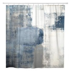 a shower curtain with blue and white paint on it