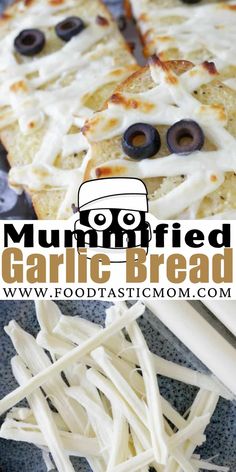 an image of some bread with cheese and olives on it that says mummified garlic bread