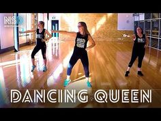 two women in black shirts and blue shoes are dancing on a wooden floor with the words dancing queen above them