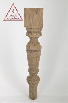 a tall wooden object on a white background