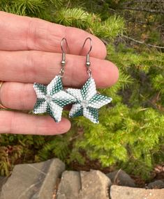 Be the star that you are and show your team spirit with these one of a kind earrings!  They are done in the Philadelphia Eagles colors of teal and white with grey accent beads. They are very lightweight and are 2" long and 1 1/8" wide or about the size of a quarter.  They take me 2 hours to make each pair.  I can even make these in a larger size for Christmas ornaments! Philadelphia Eagles Colors, Eagles Colors, Loom Designs, Football Earrings, Bead Loom Designs, Earrings Star, 3d Star, Bead Loom, Earrings Beaded