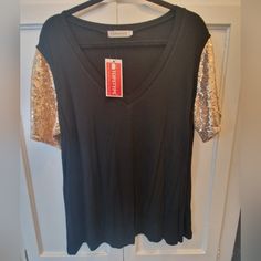 Never Worn Stretchy Black Tee With Gold Sequin Sleeves Amazon V-neck Spring Tops, Amazon V-neck Tops For Spring, Casual Amazon Short Sleeve Top, Casual Crew Neck Tops From Amazon, Casual Amazon Crew Neck Tops, Trendy Fall Tops From Amazon, Sequin Sleeve, Gold Sequin, Black Tee