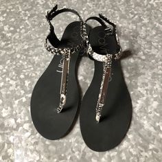 Brand New Without Tags Or Box Calvin Klein Samira Fabric Lizard Thong Sandal. 34e09019 7200100 Condition: Nwot / Nwob Tags: #Thongsandal Silver T-strap Sandals For Spring, Silver Sandals With Single Toe Strap In Synthetic, Adjustable Silver Open Toe Flip Flops, Adjustable Silver Flip Flops, Silver Open Toe Flip Flops For Party, Silver Toe Post Flip Flops For Party, Party Silver Synthetic Flip Flops, Silver Open Toe Synthetic Flip Flops, Silver Synthetic Open Toe Flip Flops