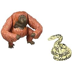 a statue of a gorilla and a snake are shown next to each other on a white background