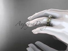 a woman's hand holding an engagement ring with the word, always design on it