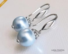 Wedding Light Blue Blush Blue Pearl Drop Silver Dangle Bridal Earrings. EARRINGS are about 1.18 inch (3cm) long from top of earring wire to bottom. BRIDAL EARRINGS SECTION: https://www.etsy.com/shop/LanaChayka?ref=seller-platform-mcnav§ion_id=11638940 BRIDAL JEWELRY SETS SECTION: https://www.etsy.com/shop/LanaChayka?ref=seller-platform-mcnav§ion_id=25839214 BRIDAL NECKLACES SECTION: https://www.etsy.com/shop/LanaChayka?ref=seller-platform-mcnav§ion_id=11638944 Elegant and classy, these earrings Wedding Light Blue, Chandelier Earrings Wedding, Blue Pearl Earrings, Bridal Necklaces, Silver Earrings Wedding, Blue Chandelier, Wedding Blush, Light Blue Wedding, Silver Pearl Earrings