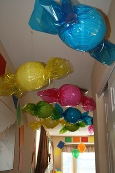 some balloons are hanging from the ceiling