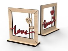 two wooden frames with hearts and the word love