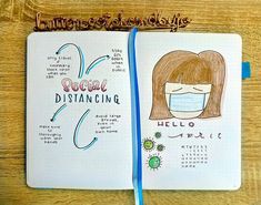 two notebooks with drawings on them and the words social distancing