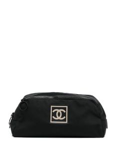 black signature interlocking CC logo logo patch to the front jacquard logo motif top zip fastening two main compartments Serial Number: 7832885 This item comes with an original authenticity seal. This item comes with an original Chanel authenticity card. Purchasing this item continues its narrative and reduces the environmental impact by avoiding the use of new resources needed to make the product from scratch, such as water, materials and electricity, and avoiding additional manufacturing impac Chanel Cosmetic Bag, Chanel Cosmetics, Shopping Chanel, Chanel 2, Cosmetic Pouch, Cc Logo, Ballet Flat Shoes, Pump Sandals, From Scratch