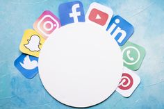 several social media icons arranged around a white circle