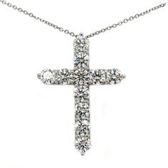 This eye catching cross pendant has an astonishing 11.25 ct. total weight of beautiful F color and VS1 clarity round brilliant cut lab created diamonds. Each diamond weighs no less than 1.00 ct. each and they are set in 14 kt. white gold on a 16" cable link chain also in 14 kt. white gold. Diamond White Cross Pendant Necklace With Brilliant Cut, Formal Diamond Cross Necklace With Brilliant Cut, Anniversary Cross Necklace In Brilliant Cut Diamond White, White Gold Cross Necklace With Brilliant Cut Cubic Zirconia, Anniversary Cross Necklace In Diamond White With Brilliant Cut, Round Diamond Cut Cross Necklace, White Gold Round Diamond Cut Cross Necklace, Brilliant Cut Round White Gold Cross Necklace, Diamond Round Cross Necklace For Anniversary