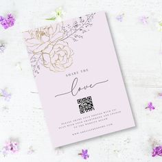 the save the date card is next to some flowers