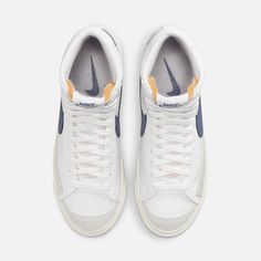 Style No. CZ1055-125 Color: White/Sail/Diffused Blue Styled for the ‘70s. Loved in the ‘80s. Classic in the ‘90s. Ready for the future. The Nike Blazer Mid ’77 delivers a timeless design that’s easy to wear. Its unbelievably crisp leather upper breaks in beautifully and pairs with bold retro branding and luscious suede accents for a premium feel. Exposed foam on the tongue and a special midsole finish this off in style. Nike Blazer Mid '77 Women's Shoes. Nike Blazer Mid 77 Women, Style Nike Blazer, Clean White Leather, Retro Branding, Nike Retro, Nike Blazer Mid 77, Nike Blazers Mid, Nike Blazer Mid, Blazer Mid