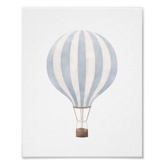 a blue and white striped hot air balloon