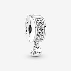 Functional yet stylish, the Family Always Pavé Clip Charm features an alternating infinity symbol and stone pattern on the rim. The polished sterling silver heart dangle is engraved with "Always" to remind us that the love of family is eternal. This clip charm has a silicone grip to prevent sliding and can be styled anywhere on a bracelet except raised charm dividers. Pandora Family, Charms Pandora, Bracelet Pandora, Mors Dag, Infinity Symbol, Stone Pattern, Silver Gifts, Pandora Bracelet, Sterling Silver Heart