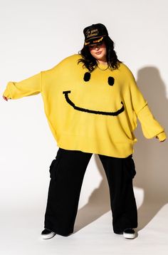 Lala Original Designs are thoughtfully designed in-house. These clothes were made for you. - Yellow sweater with big smile face design- Super oversized and slouchy- Long sleeves with drop shoulder- Bubble sleeve with 6" ribbed cuff- Wide 6" ribbed hemSierra is 5'8", typically wears a size 8 and is wearing a S/M. Jayci is 5'8", typically wears a size 20 and is wearing a 2XL/3XL.100% acrylic © Dressed in LALA™ 2024 // Design owned and created by Dressed in LALA™ Big Smiley Face, Satin Playsuit, Blazer Set, Flannel Jacket, Sunshine Yellow, Bubble Sleeve, Sweater Collection, Oversize Knit, Yellow Sweater