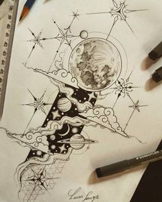 a pencil drawing of a space station on paper with stars and planets in the background