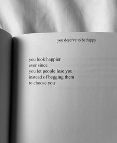 an open book with the words you don't have to be happy