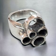 "Funky mid-century hand crafted modernist ring circa 1960s. Solid Sterling silver with a flat backed shank, this unique piece is a weighty 21 grams. Size 6½ US.  This ring appears to have been resized at some point. The maker's hallmark is partially obscured as a result. Visible is a \"BO\" and also \"STER\" on the inside of the band. Thus is a fantastic piece in excellent vintage condition!" Modern Metal Signet Ring, Modern Metal Dome Ring With Polished Finish, Modernist Signet Ring With Polished Finish, Modern Metal Rings With Unique Design, Modernist Open Ring With Polished Finish, Contemporary Silver Ring With Unique Design, Modern Silver Metal Dome Ring, Handmade Modern Open Signet Ring, Modernist Silver Open Signet Ring