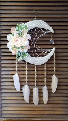 This item is a 3 in 1. It is a dreamcatcher, wreath and a Suncatcher.  The top part is a metal wreath frame that has been cut and shaped into a crescent moon and wrapped with a beautiful cream and gold mesh fabric. The center of the moon has webbing that is made using off white colored 100% cotton string, champagne colored ab crystals and peach colored porcelain crystals. Hanging from the tip of the moon are a string of clear ab crystals, champagne ab crystals and pretty gem bead spacers. At the Cream Wreath, Moon Wreath, Crystals Hanging, Metal Wreath Frame, Country Farmhouse Style, Floral Moon, Country Style Decor, Peaches Cream, Metal Wreath