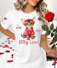 Embrace sweet dreams with our cute Abyssinian Kitty Love oversized nightshirt, a perfect present for  Valentine's Day, anniversaries, or birthdays. Give to your best friend, girlfriend, mom, wife, sister, or grandma who adores cats. Available in sizes 2XS - 6XL, this soft nightgown is incredibly comfortable and beautifully designed with a cute Abyssinian kitten in red heart pajamas on the front and pink hearts printed on the sleeves and back. Whether you're a cat owner yourself or want to pamper someone special, this nightgown is the ultimate choice. Our nightshirt features an oversized fit, stretchy fabric, and a drop shoulder for extra comfort. 96% polyester, 4% spandex Medium-weight fabric Smooth and stretchy fabric Oversized fit Lowered armhole with a widened sleeve and a drop shoulder Heart Pajamas, Abyssinian Kittens, Cute Nightgowns, Kitty Love, Friend Girlfriend, Galentines Day, Abyssinian, Women's Nightgowns, Cat Owner