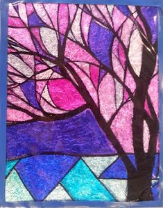 a stained glass window with a tree on it