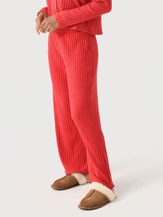 DESCRIPTION:A cozy straight-leg pant made from silk-like ribbed fabric.FEATURES:Smocked WaistbandLettuce Edge HemStraight SilhouetteInseam: 29.25 in. (S)Ribbed Fabrication97% Polyester, 3% SpandexRelaxed FitModel is wearing size Small pant.Model's Measurements: Height: 5'8" | Bust: 34C | Waist: 24" | Hips: 36.5" | Dress Size: 2-4 (US) Relaxed Fit Ribbed Pants, Red Stretch Ribbed Bottoms, Red Sleep Pants With Elastic Waistband, Cozy Full-length Pants With Ribbed Waistband, Red Striped Pajamas, Hair Socks, Brighton Jewelry, Loungewear Shorts, Sweater Skirt