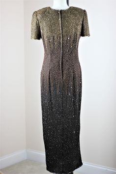 "Long Brown Silk sequin beaded dress. Formal, modest and beautiful!! Excellent condition Measuring: 58\" length Bust: 38\" Waist: 30\" Hip: 38\"+ Pet Free/smoke free Enjoy!" Evening Fitted Sequin Fabric With Rhinestones, Formal Fitted Sparkling Sequin Fabric, Formal Sparkling Sequin Fabric, Fitted Embellished Sequin Dress With Short Sleeves, Fitted Short Sleeve Embellished Sequin Dress, Evening Fitted Sequined Mother Of The Bride Dress, Festive Evening Sequin Dress With Short Sleeves, Festive Short Sleeve Sequin Evening Dress, Vintage Sequin Evening Dress