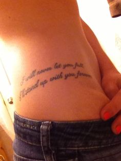 a woman with a tattoo on her stomach that reads, you will always be your friend