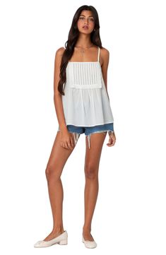 Dainty scalloped eyelet trim surrounds the pleated bib of this crisp cotton camisole cut in a relaxed fit. Square neck Adjustable straps 100% cotton Machine wash, line dry Imported Summer Solid Color Tops With Lace Trim, Cotton Tank Top With Lace Trim For Day Out, Casual Cotton Camisole For Daywear, Cotton Ruffled Camisole For Day Out, Cotton Ruffle Camisole For Day Out, Spring Cotton Sleeveless Camisole, Cotton Camisole With Lace Trim For Day Out, Cotton Cami Tank Top For Daytime, Spring Cotton Camisole