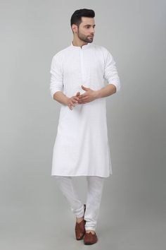 White cotton kurta with all over checkered pattern, tonal thread and sequin embroidery. Paired with gathered churidar. - Aza Fashions Fitted Cotton Churidar For Puja, Fitted Cotton Salwar Kameez For Puja, White Long Sleeve Handloom Traditional Wear, Transitional Long Sleeve Cotton Churidar, White Cotton Salwar Kameez With Pallu, Cotton Salwar Kameez With Pallu In White, Long Sleeve Cotton Churidar For Puja, Cotton Churidar With Zari Work And Straight Kurta, Unstitched Cotton Kurta For Diwali