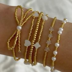 Trendy Gold Beaded Bracelets, Trendy Gold Bracelets With Round Beads, Trendy Gold Stretch Bracelet With Spacer Beads, Gold Trendy Stretch Bracelet With Spacer Beads, Gold Beaded Chain Trendy Bracelets, Dainty Gold Bracelets With Colorful Beads, Trendy Gold Stretch Bracelet With Beads, Trendy Gold Stretch Bangle Bracelet, Dainty Gold Bracelet With Colorful Beads