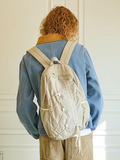 This casual backpack features asymmetric front design that adjust shirring effect. It's finished with reinforced back and bottom, and fitted with laptop pocket inside so ideal for your practical use.- Top handle- Zipper closure- Lace-up drawcord detail- Drawstring detail- Side pockets- Adjustable shoulder straps- Unisex wear Cheap Brown Nylon Backpack, Beige Nylon Backpack For Outdoor Activities, Beige Nylon Outdoor Backpack, School Backpack With Drawstring In Nylon, Functional Nylon Backpack With Drawstring For School, Nylon School Backpack With Functional Drawstring, School Backpack With Functional Drawstring In Nylon, Beige Nylon Backpack With Zipper Pocket, Casual Nylon Softback Backpack