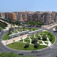 an aerial view of a roundabout in the middle of a city