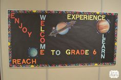 a bulletin board with the words welcome to grade 6 on it and pictures of planets