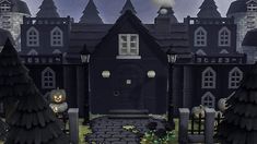 an animated halloween scene with pumpkins and creepy houses