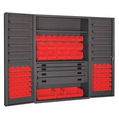 an open storage cabinet with many red bins