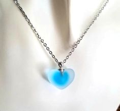 New Handmade Turquoise Frosted Glass Heart Choker Necklace ♡ Beautiful frosted glass puff heart pendant with a turquoise blue heart core. ♡ Stainless steel 1mm cable chain measures 16 inches long plus has a 2 inch extender. ♡ Lobster clasp closure ♡ Stainless steel chain will not tarnish ☆ Matching earrings available in my ebay store ♡ Ships within 24 hours of purchase Monday-Saturday Light Blue Heart Beads Jewelry Gift, Light Blue Heart Beads Jewelry For Gift, Light Blue Jewelry For Valentine's Day Gift, Blue Glass Heart Beads Jewelry, Blue Heart Charm Necklace For Gift, Blue Glass Jewelry With Heart Beads, Light Blue Heart-shaped Jewelry Gift, Blue Heart Beads Necklace As Gift, Handmade Turquoise Heart Necklace Gift