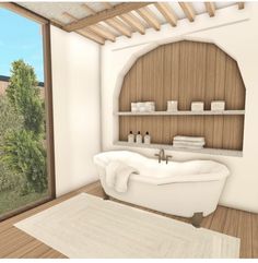 a white bath tub sitting in a bathroom next to a wooden shelf filled with towels