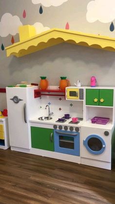 a play kitchen with lots of toys in it